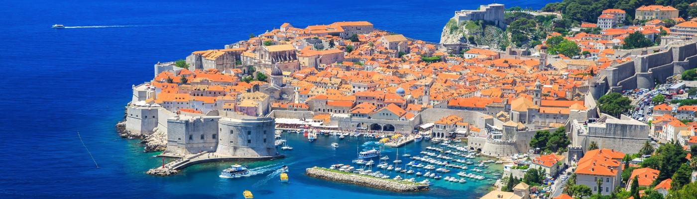 Aerial view of the walled Old Town of Dubrovnik and Adriatic Sea